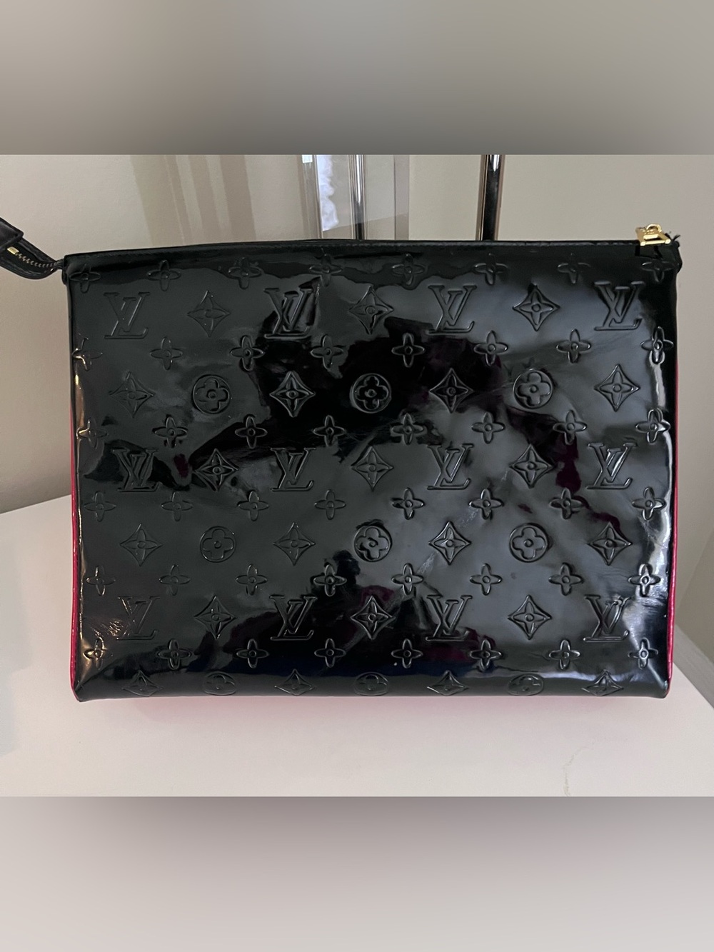 Monogramed Black Patent Leather Zip top 13x10 clutch with red Interior.